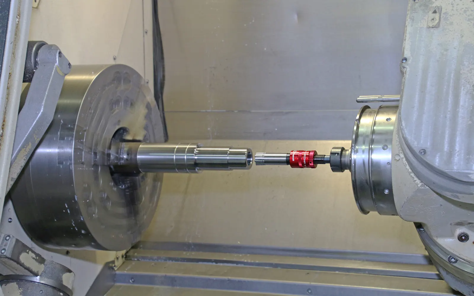 CNC lathe machining a precision shaft